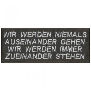 Aufnäher - Wir werden niemals... - 06104 - Gr. ca. 11,5 x 4,5 cm - Patches Stick Applikation